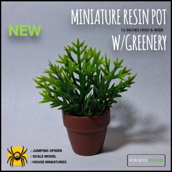 Miniature resin flower pot with artificial greenery title